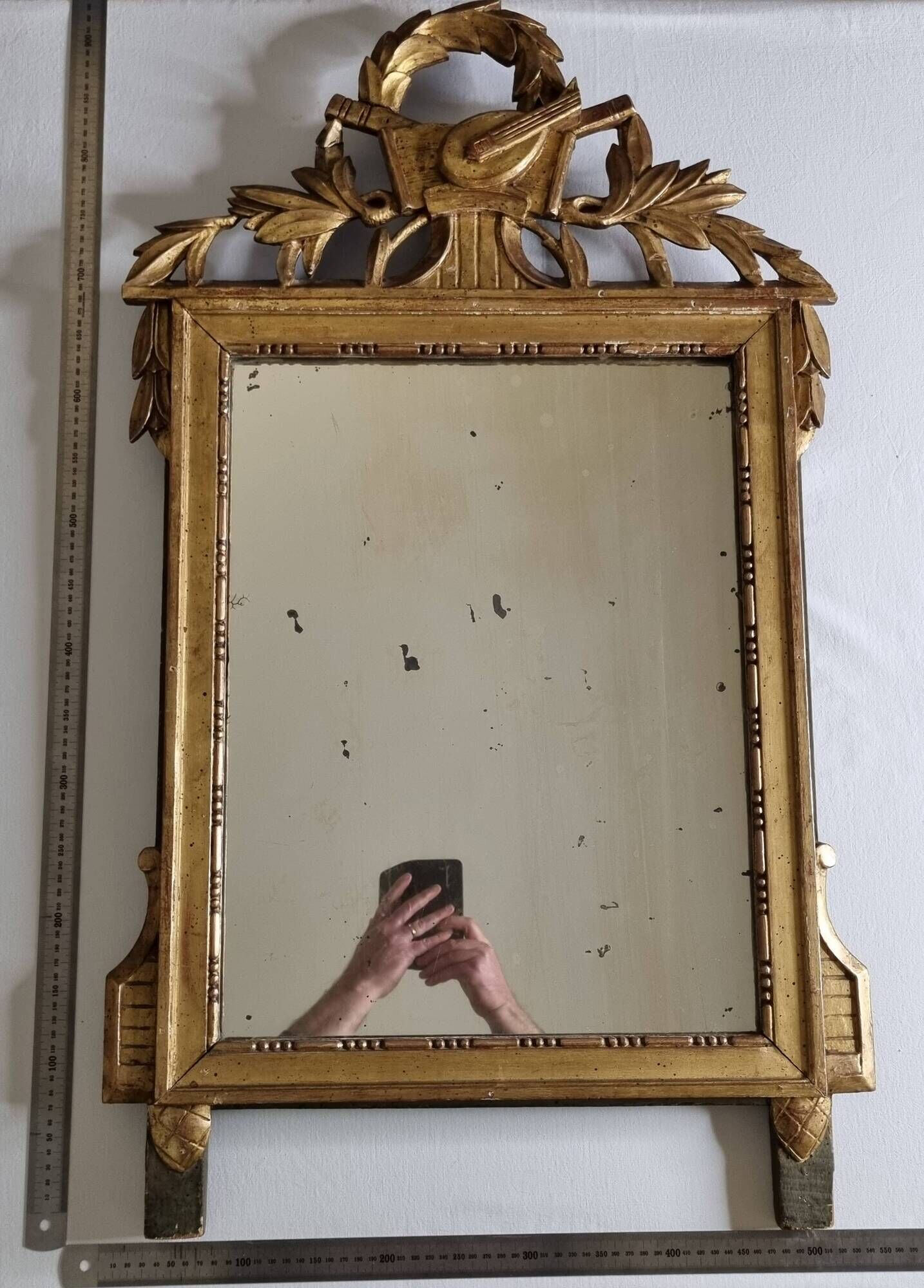 Antique carved and gilded wooden mirror, Louis XVI style – 54 x 92 cm