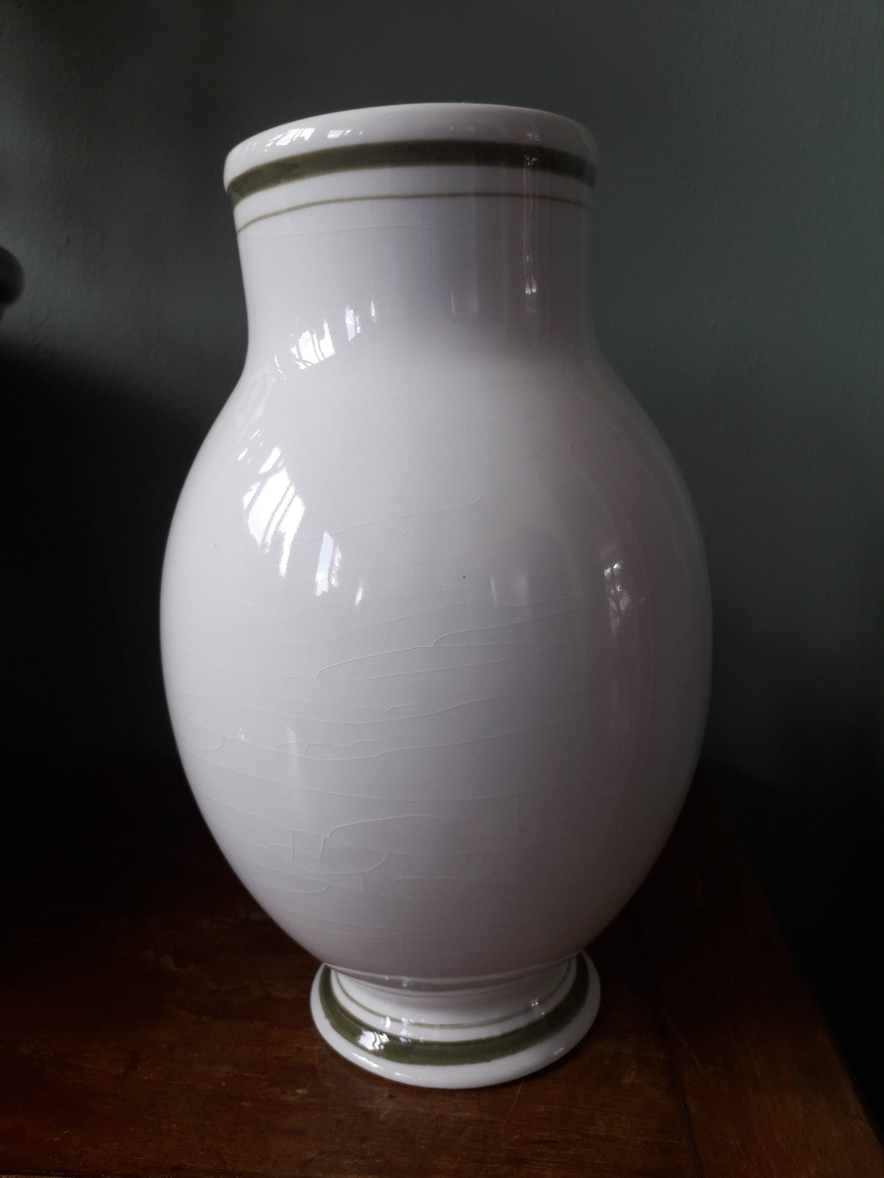 Vintage vase with herbalist pot decor