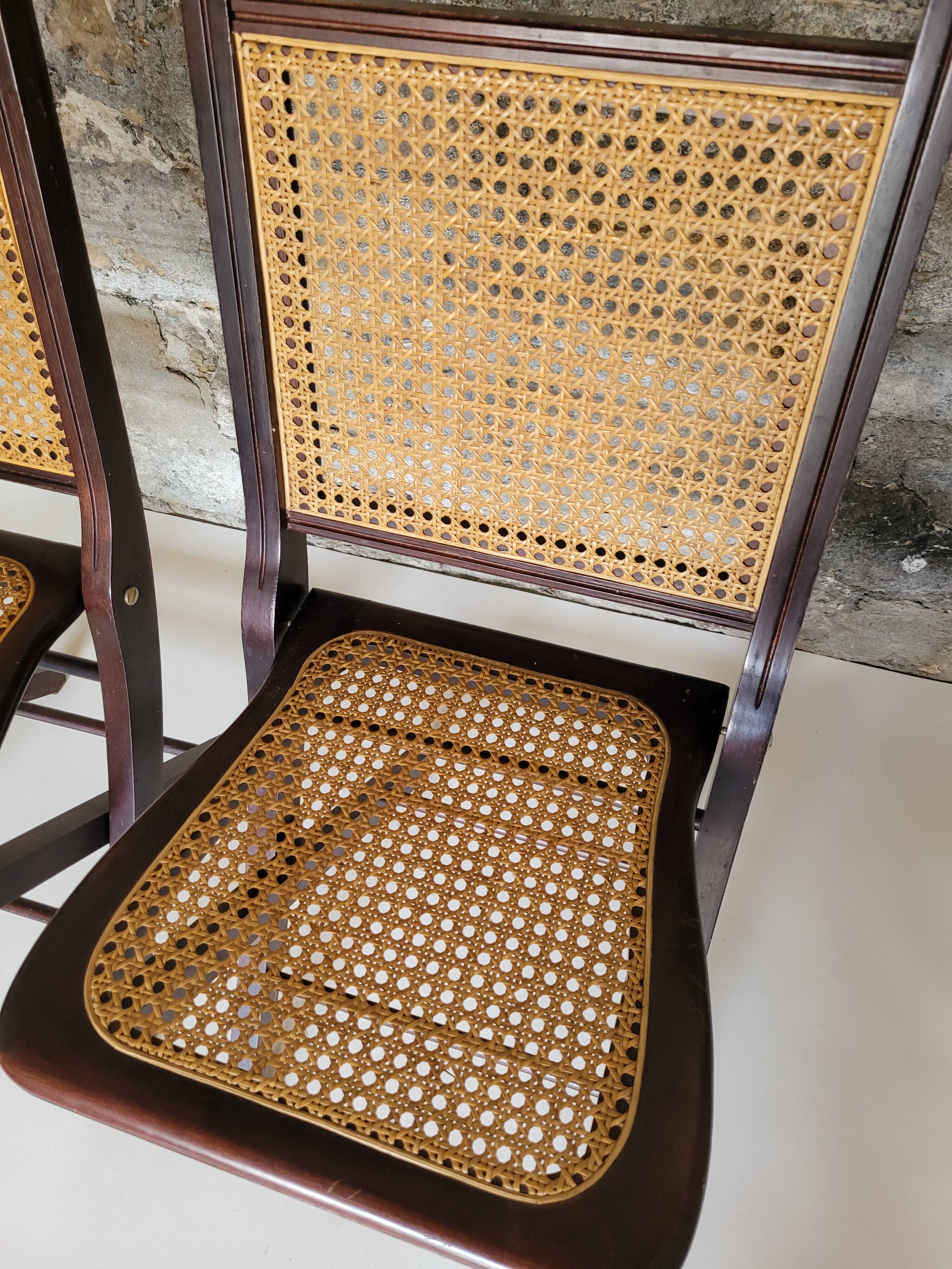 Pair of folding cane chairs
