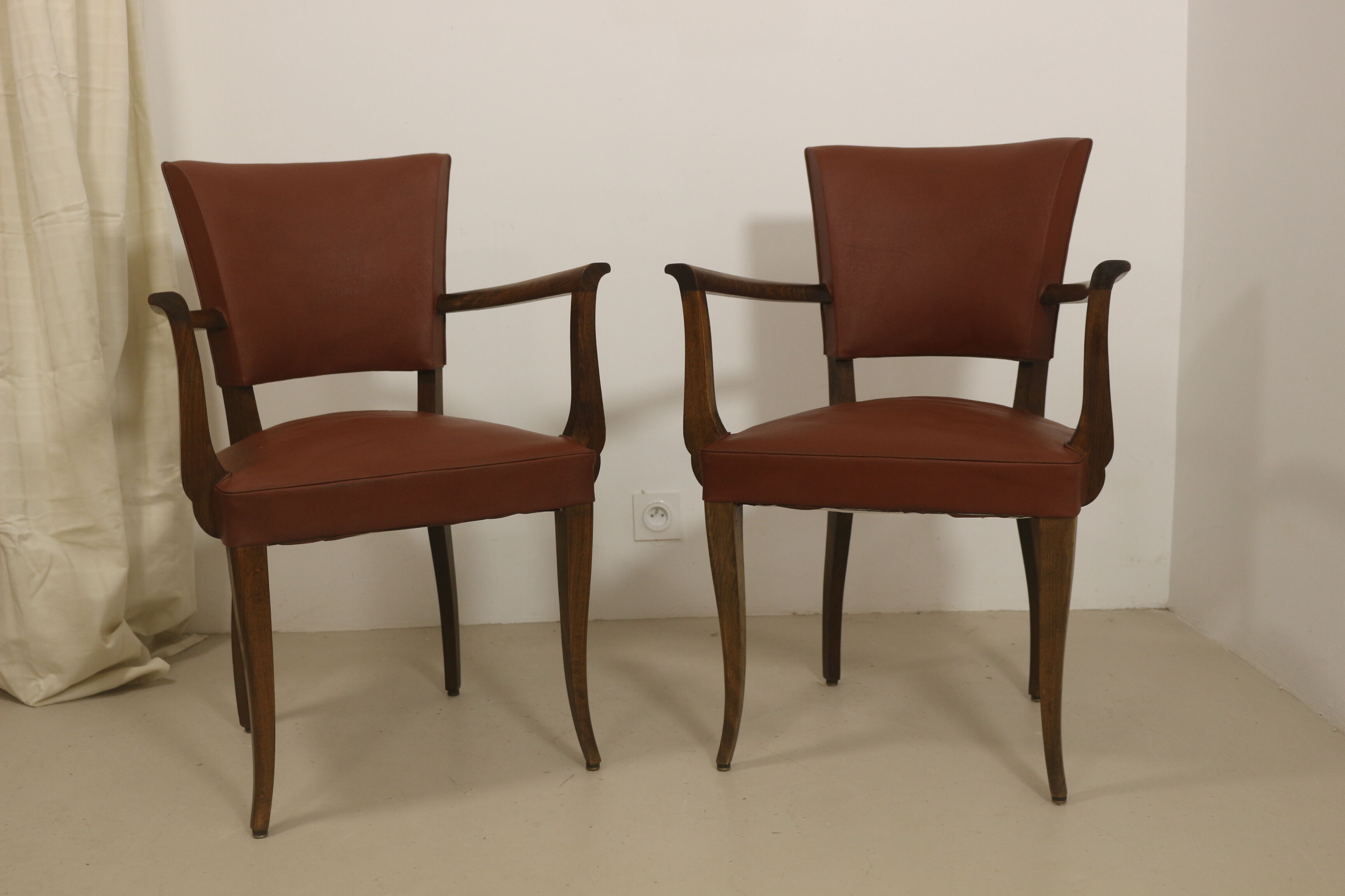 Pair of vintage bridge armchairs year 60 in imitation rust leather.