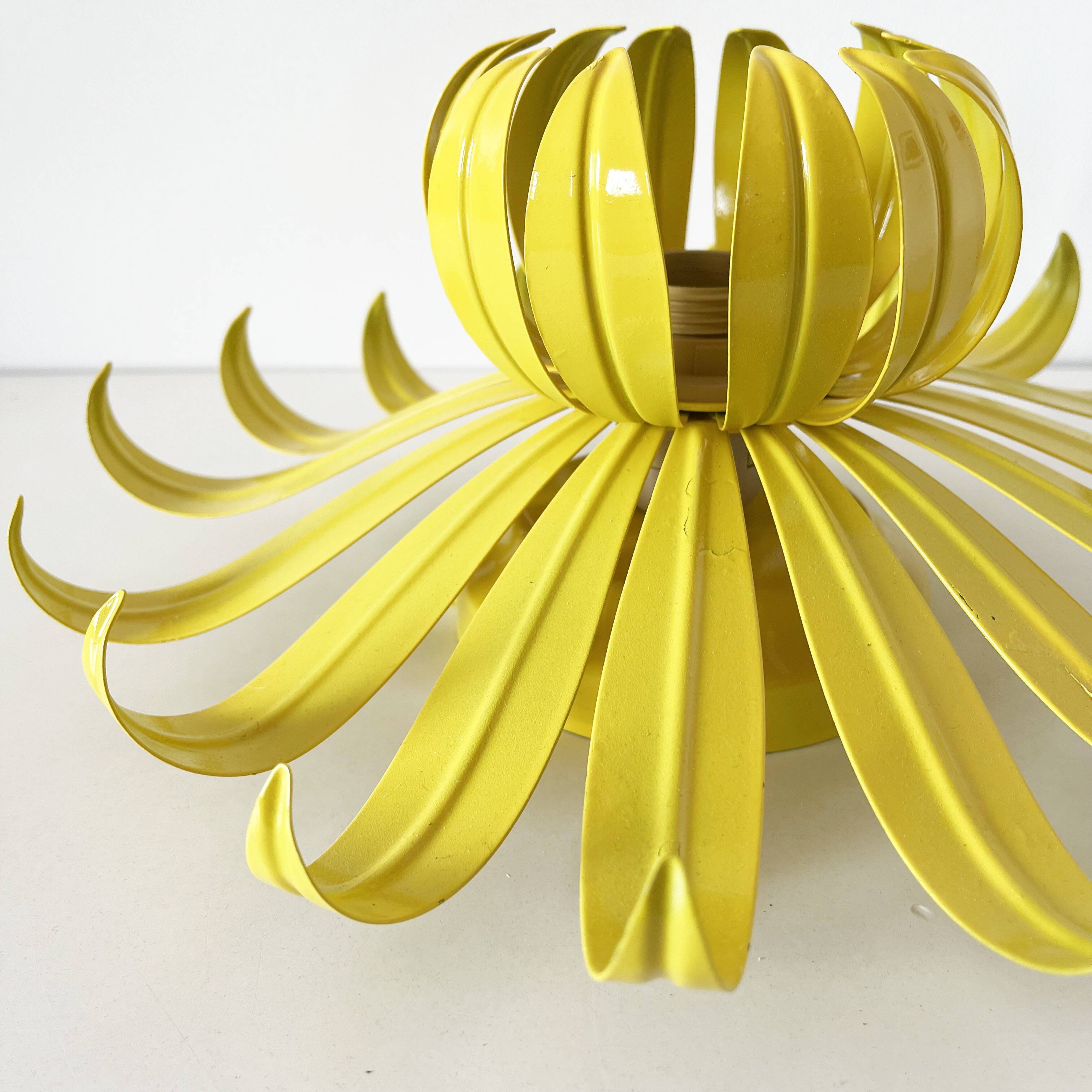 Vintage yellow metal flower wall light