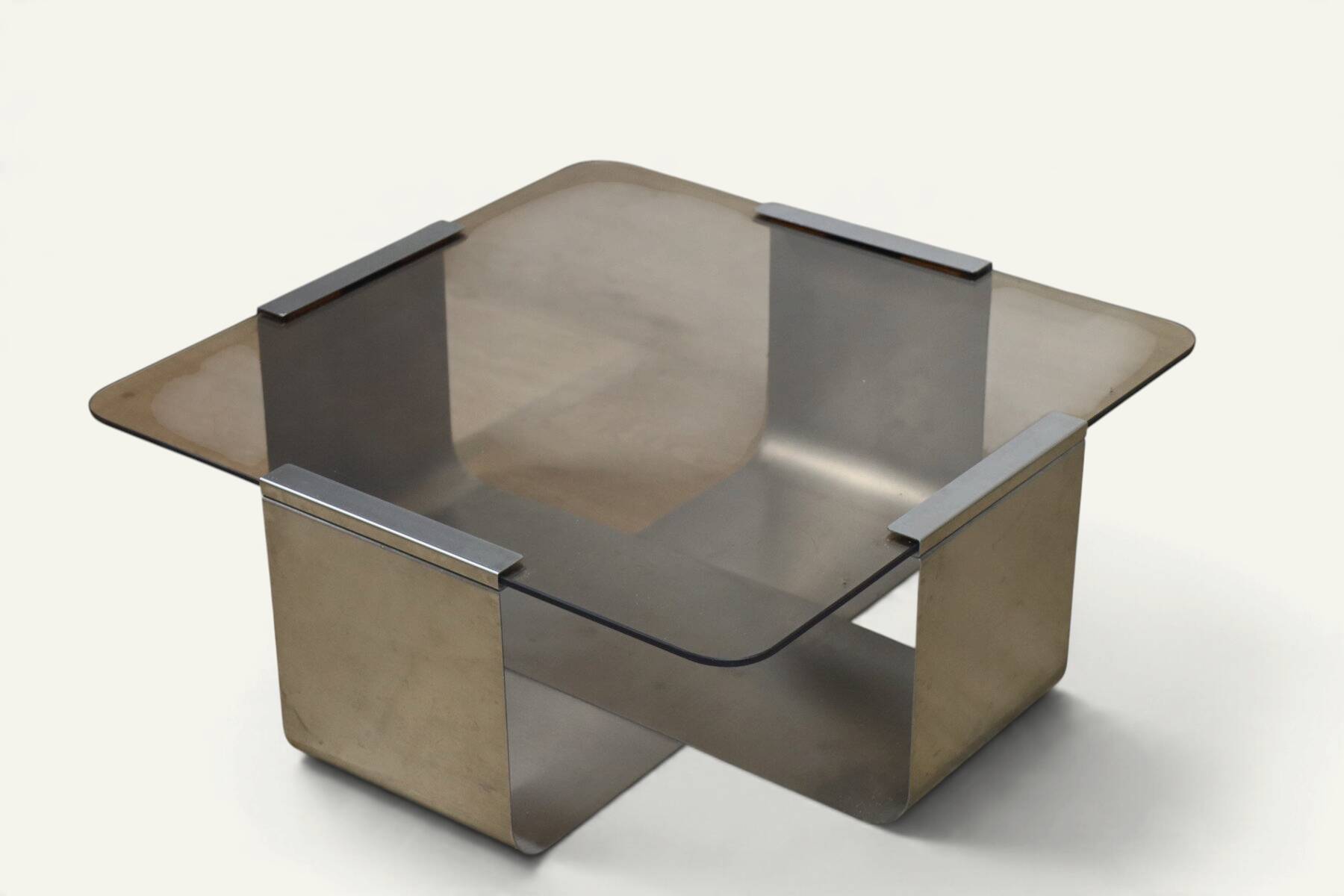 Brushed steel and smoked glass coffee table, by François Monnet – 1970s
