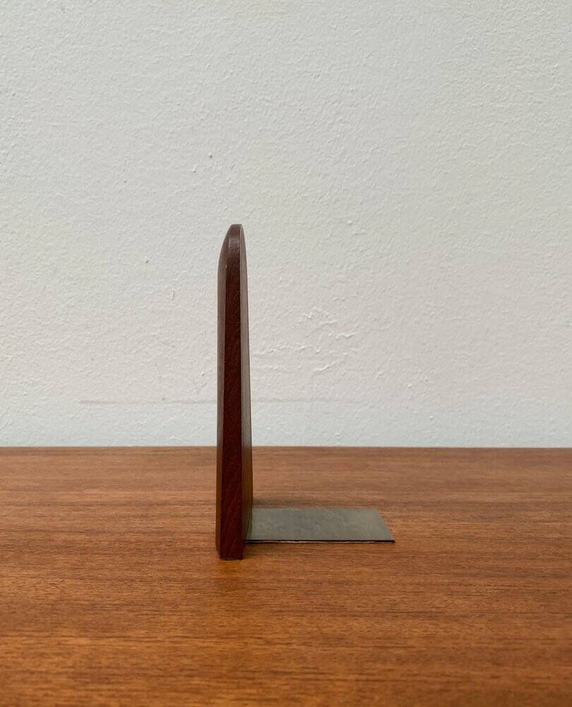 Mid-century Scandinavian bookends in teak and brass.