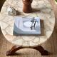 Coffee table in wood, marble and onyx.