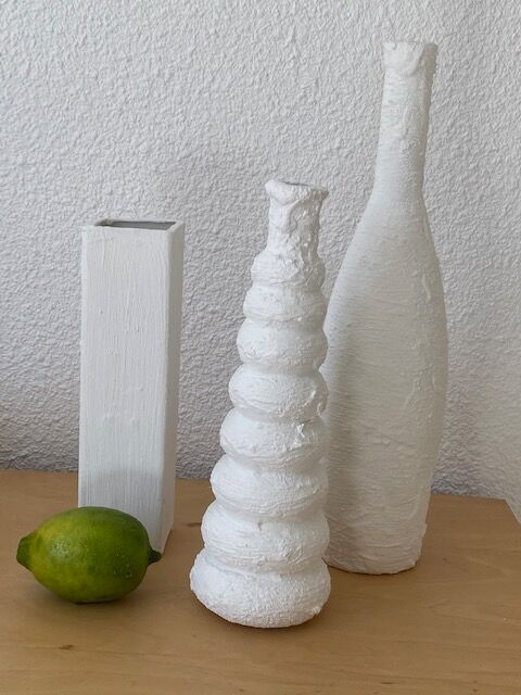 Trio of white vases