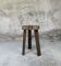 Tabouret tripode brutaliste en bois