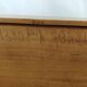 Wooden chest of drawers with gilded handle