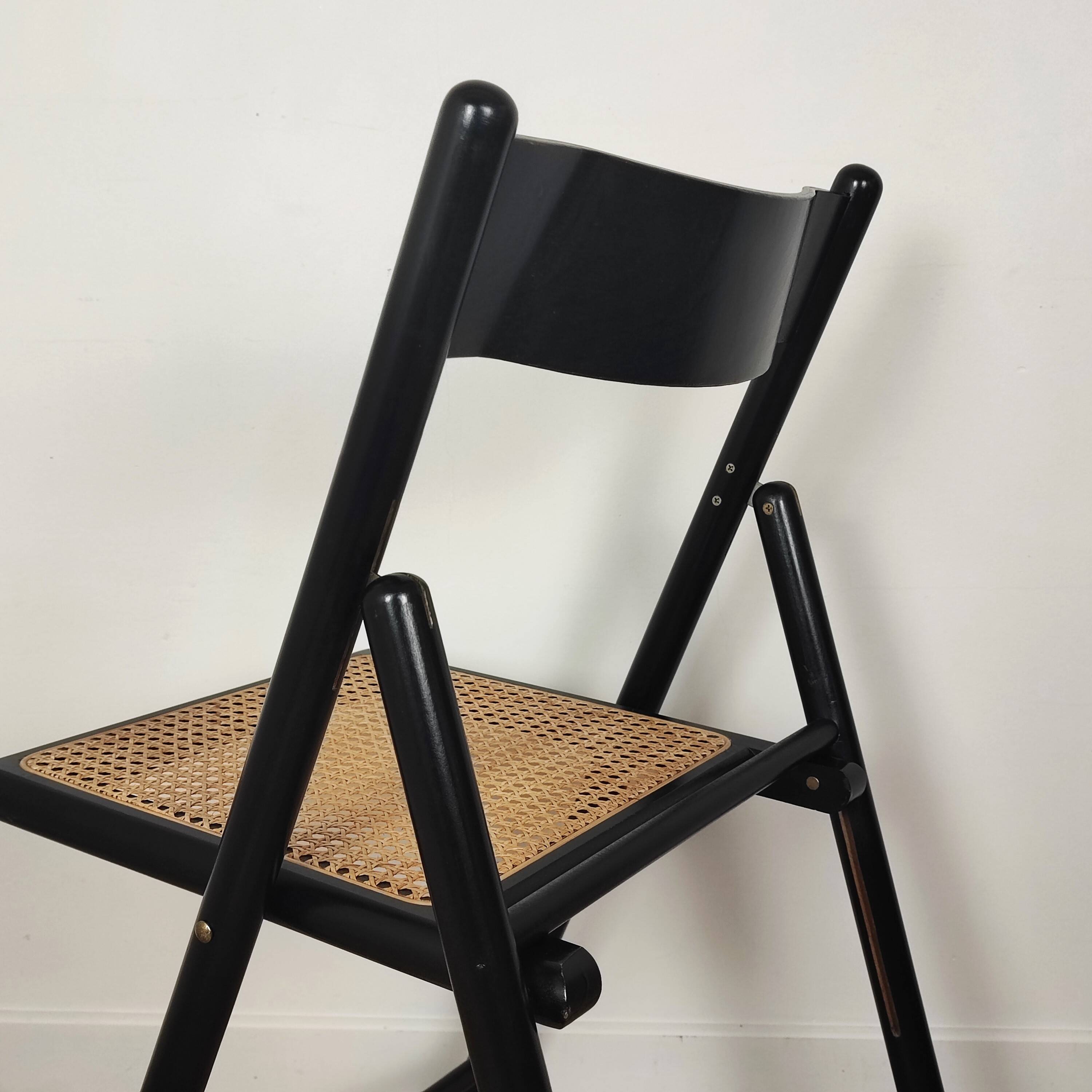 Pair of wooden and rattan folding chairs