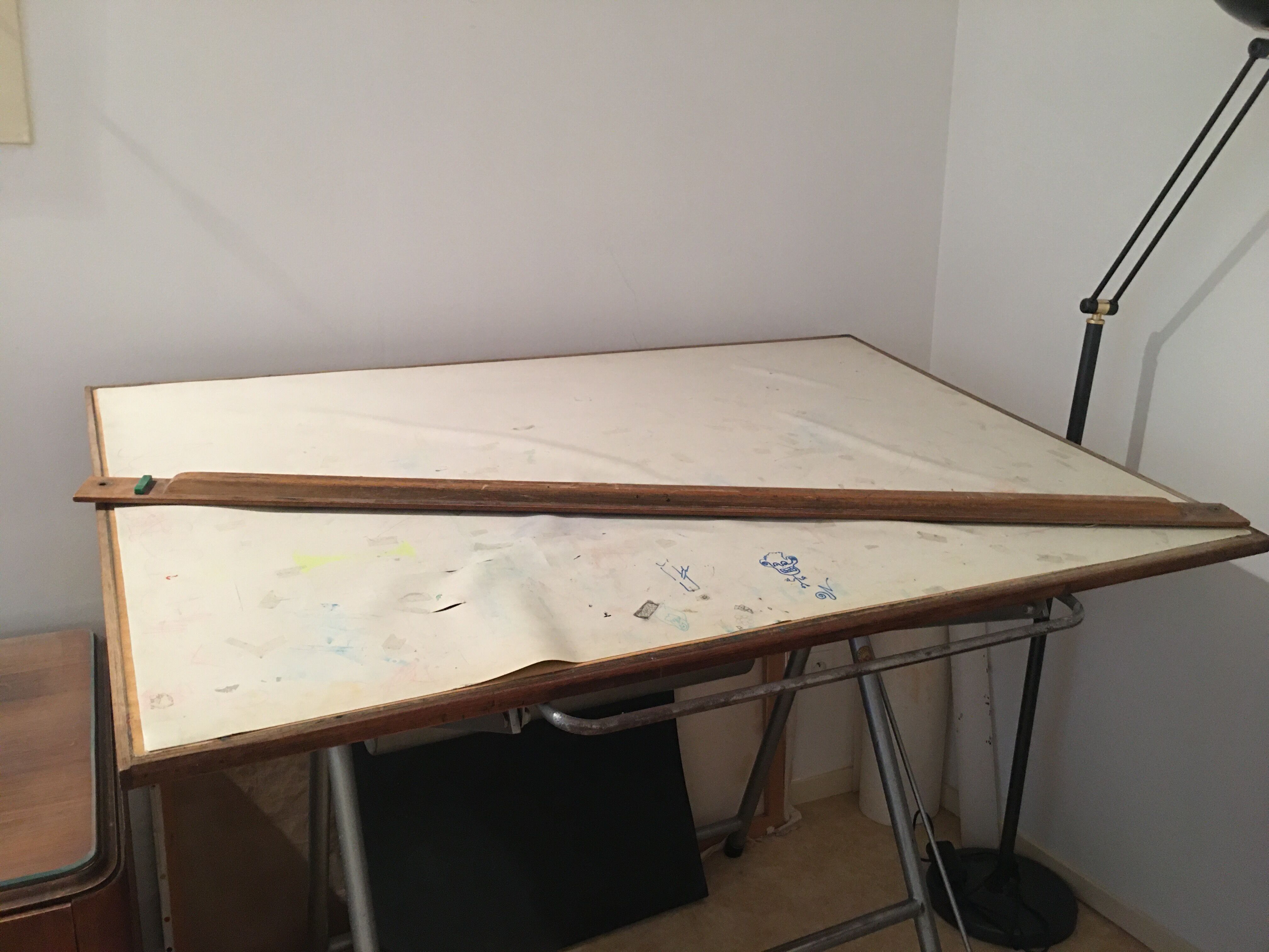 Architect drawing table with ruler