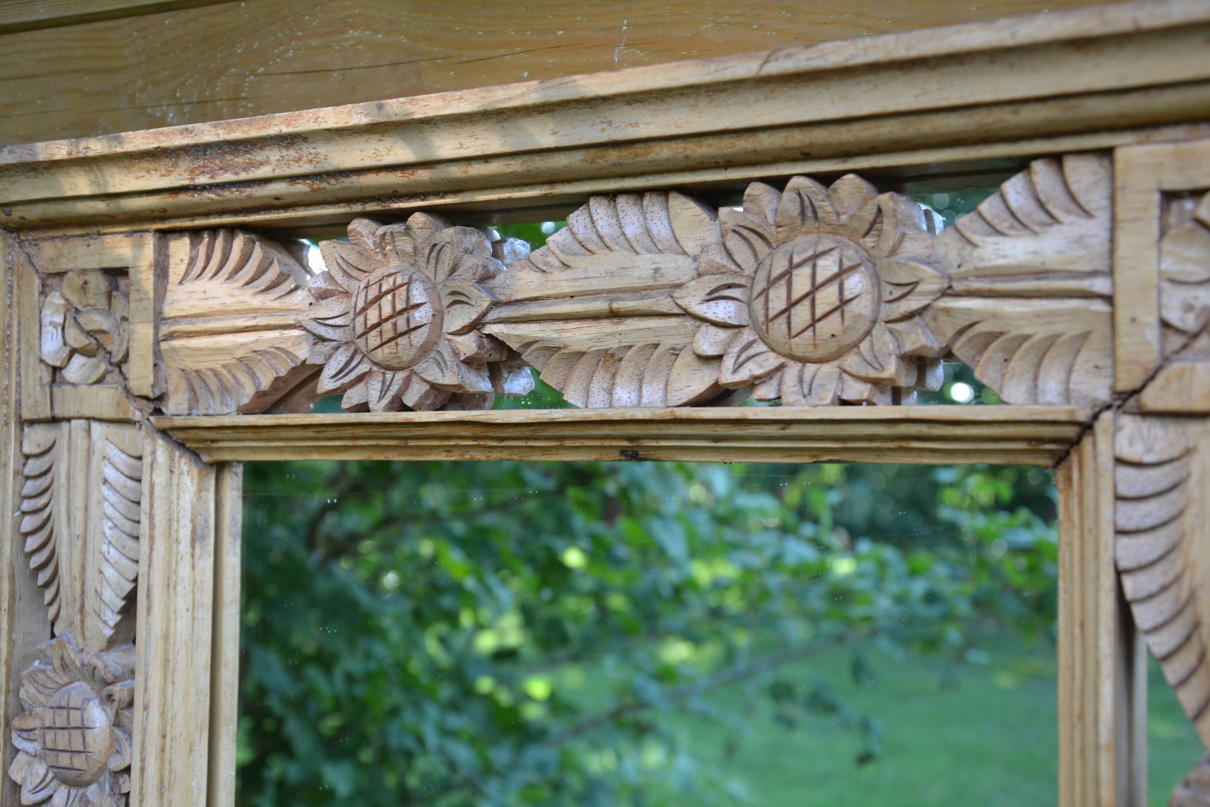 Large carved wooden mirror