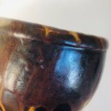 Metallic brown ceramic torso vase