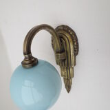 Art deco wall lamp in brass and soft blue opaline globe