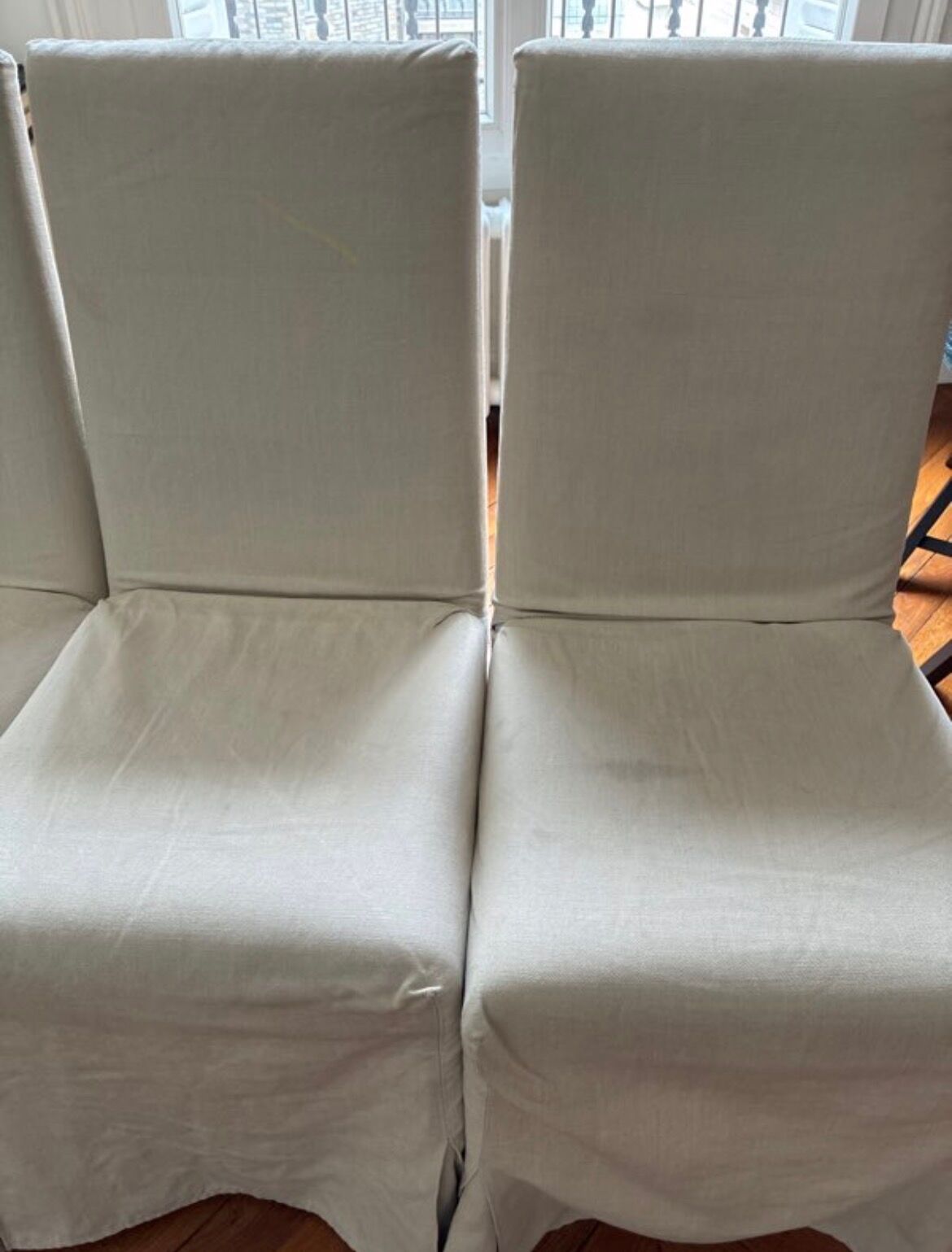 Set of 6 Maxalto chairs with covers.