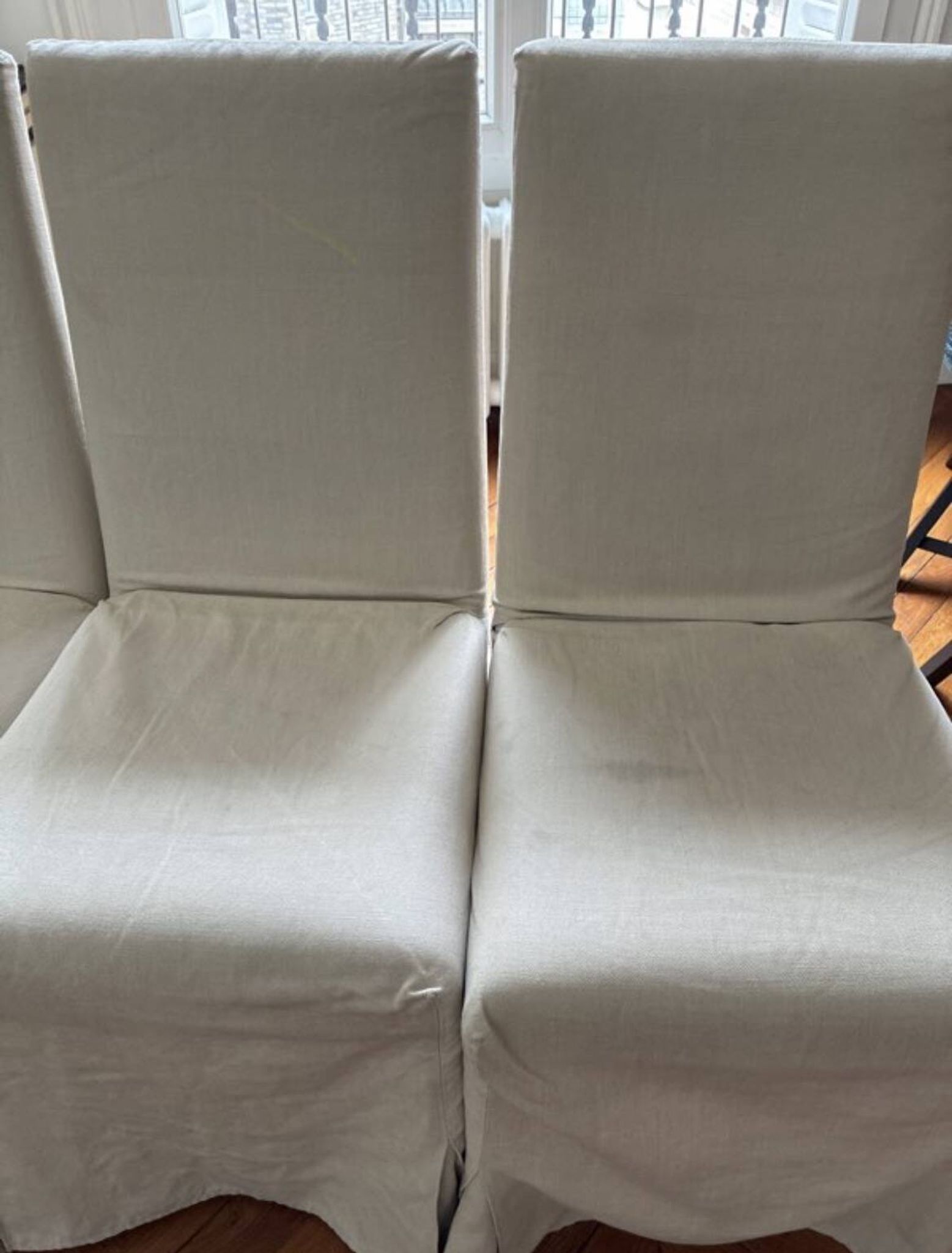 Set of 6 Maxalto chairs with covers.