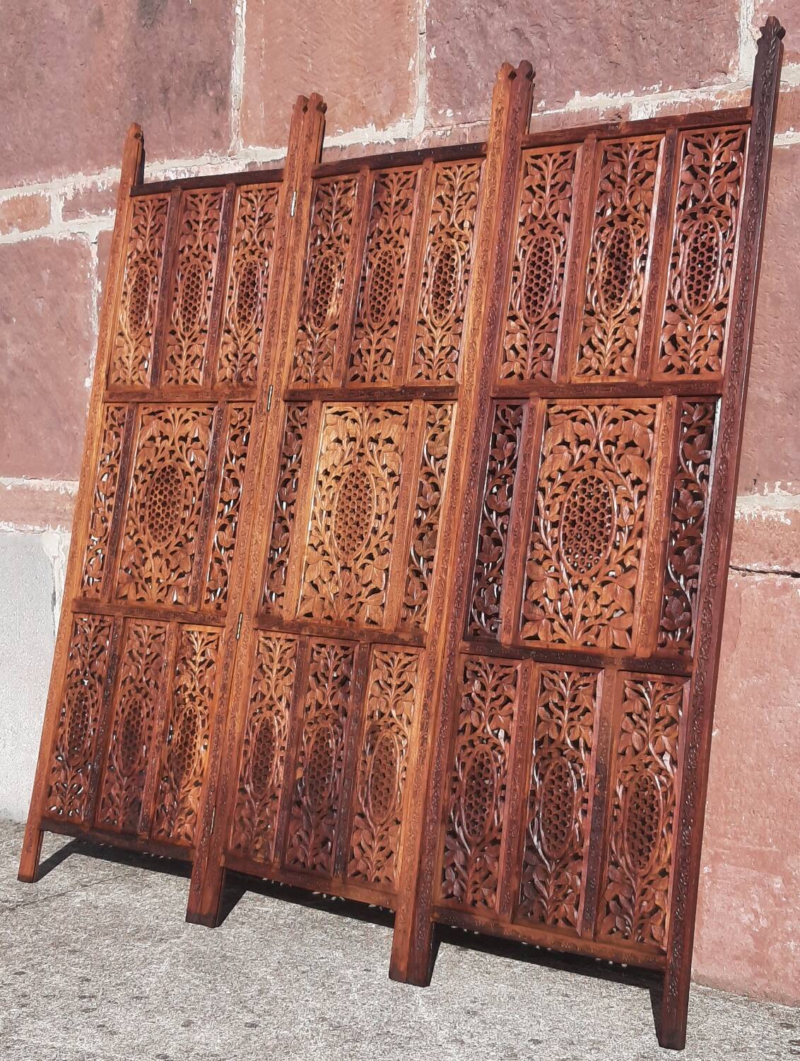 Carved solid wood screen.