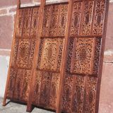 Carved solid wood screen.