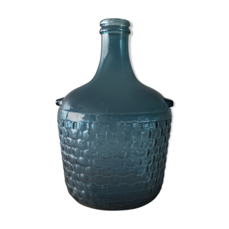 Demijohn in blue molded glass