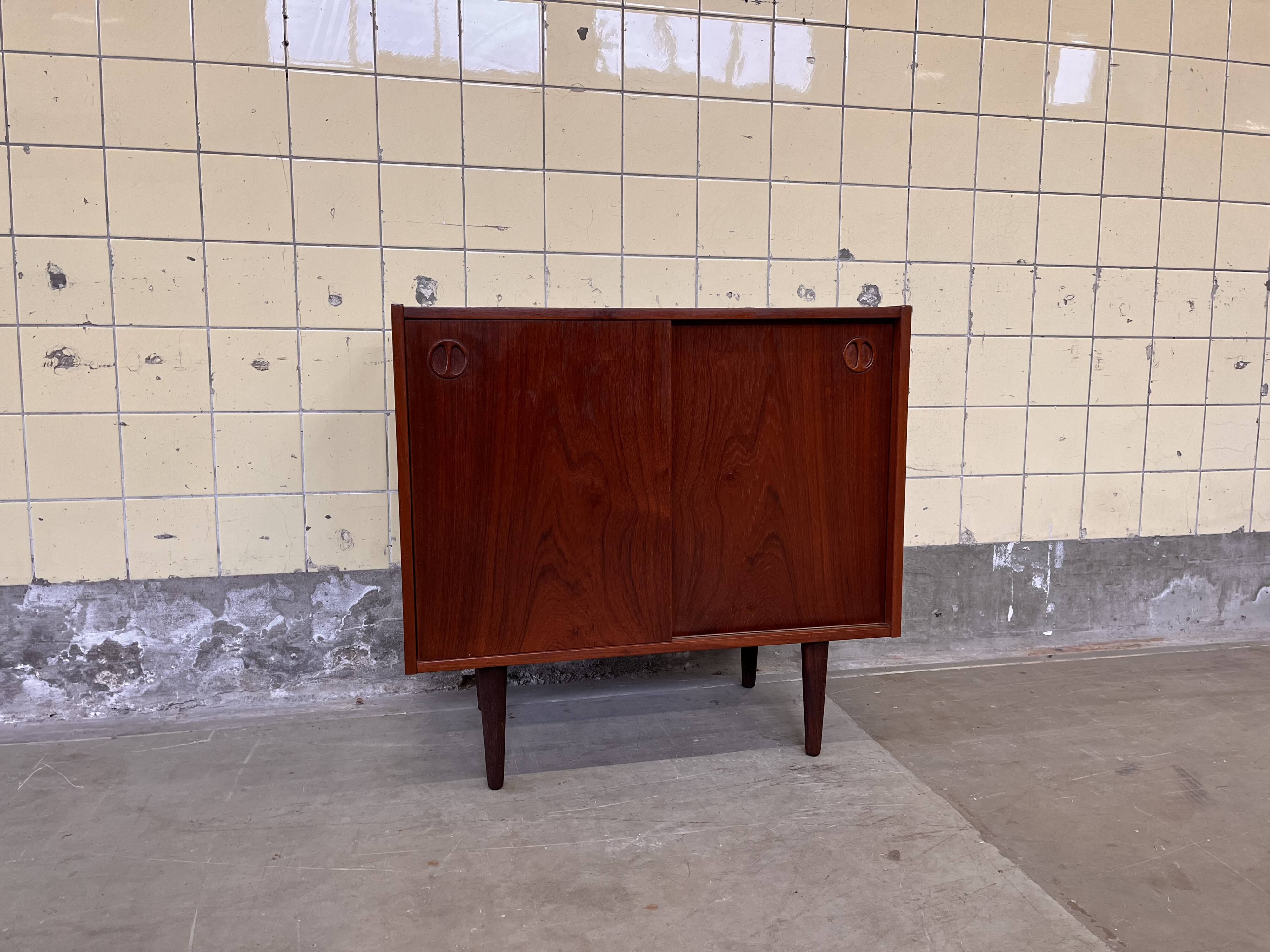 Vintage Danish cabinet with sliding doors