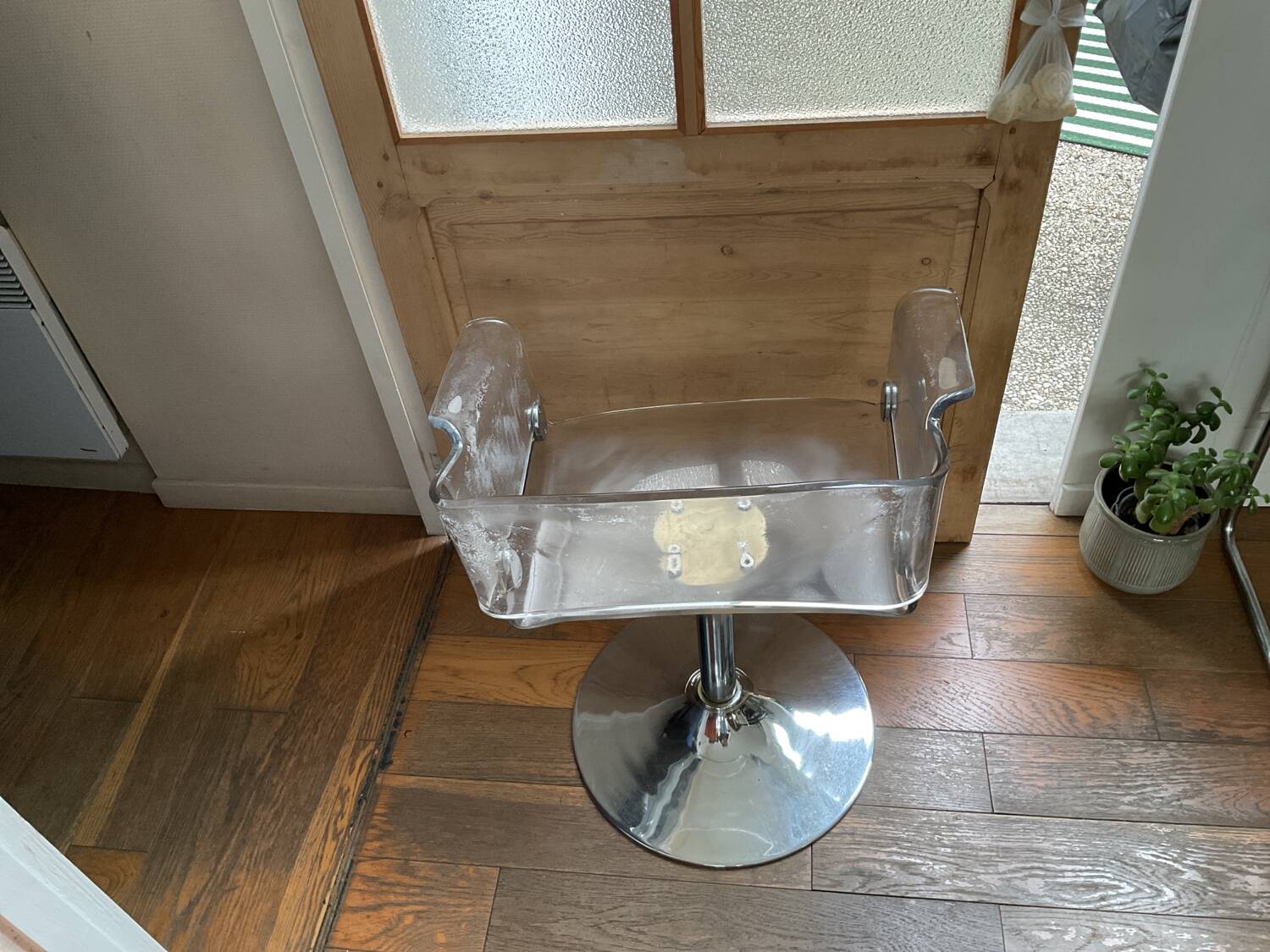 Plexiglas armchair with steel base from the 90s