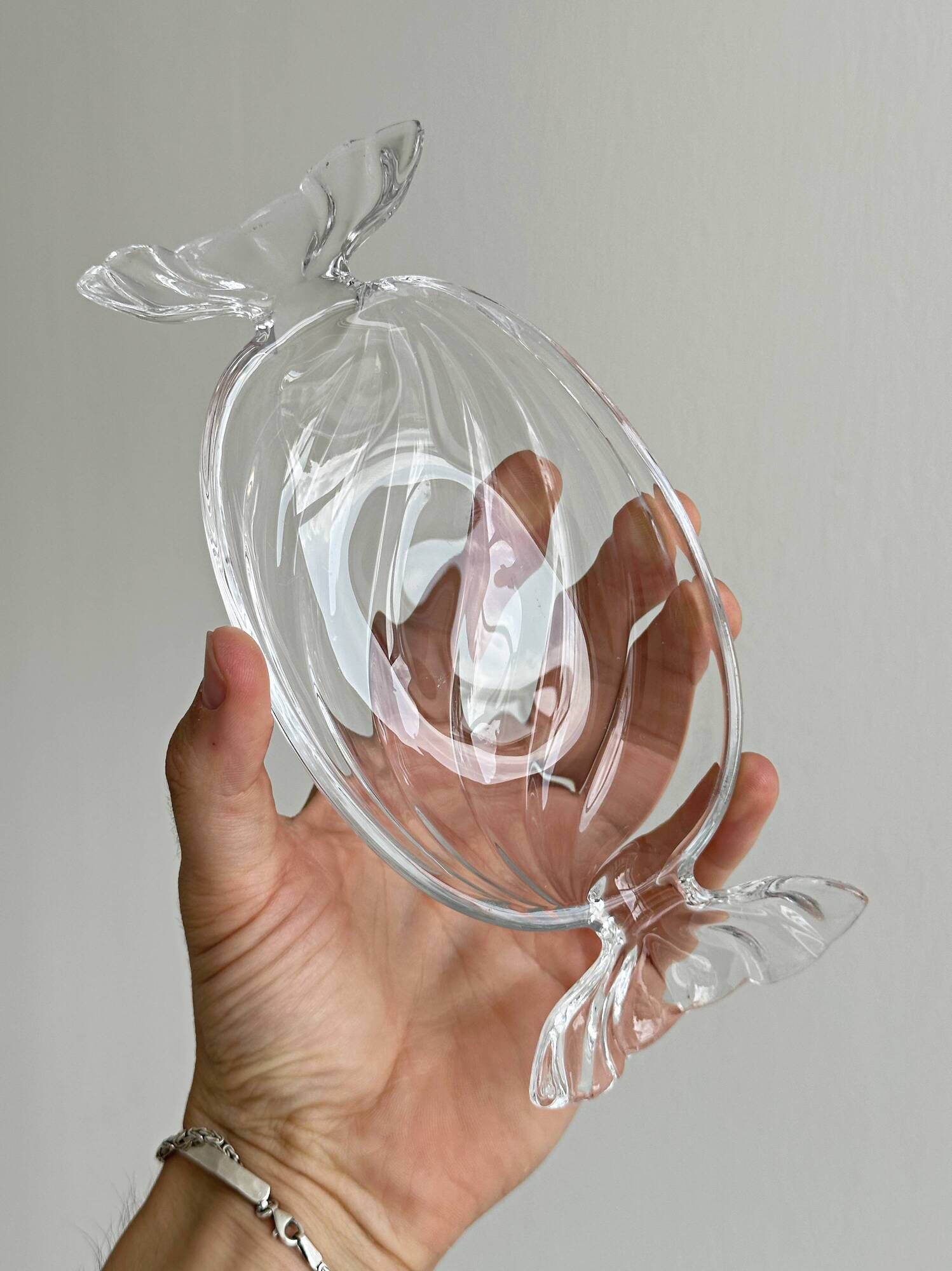 Vintage thick glass candy-shaped catchall.