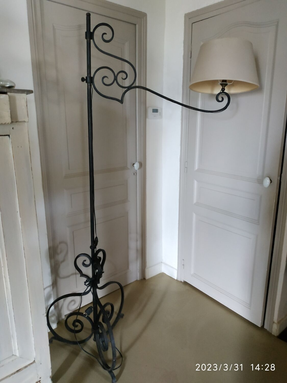 Black wrought iron floor lamp