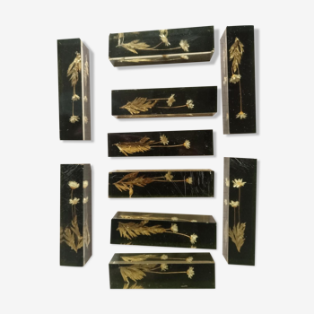 Knife holders in bakelite and gold leaf