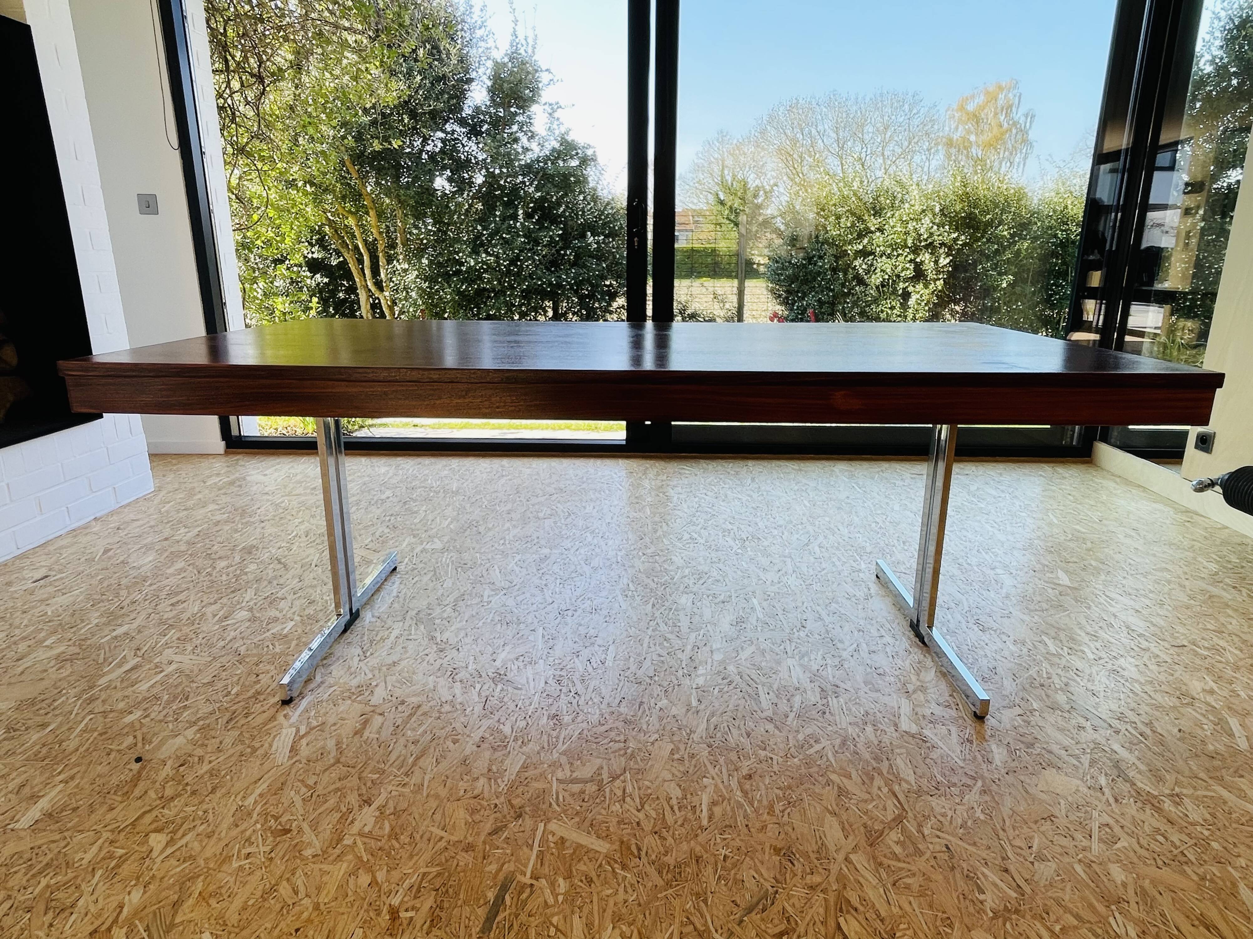 Desk that can serve as a dining table.