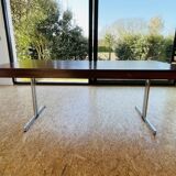 Desk that can serve as a dining table.