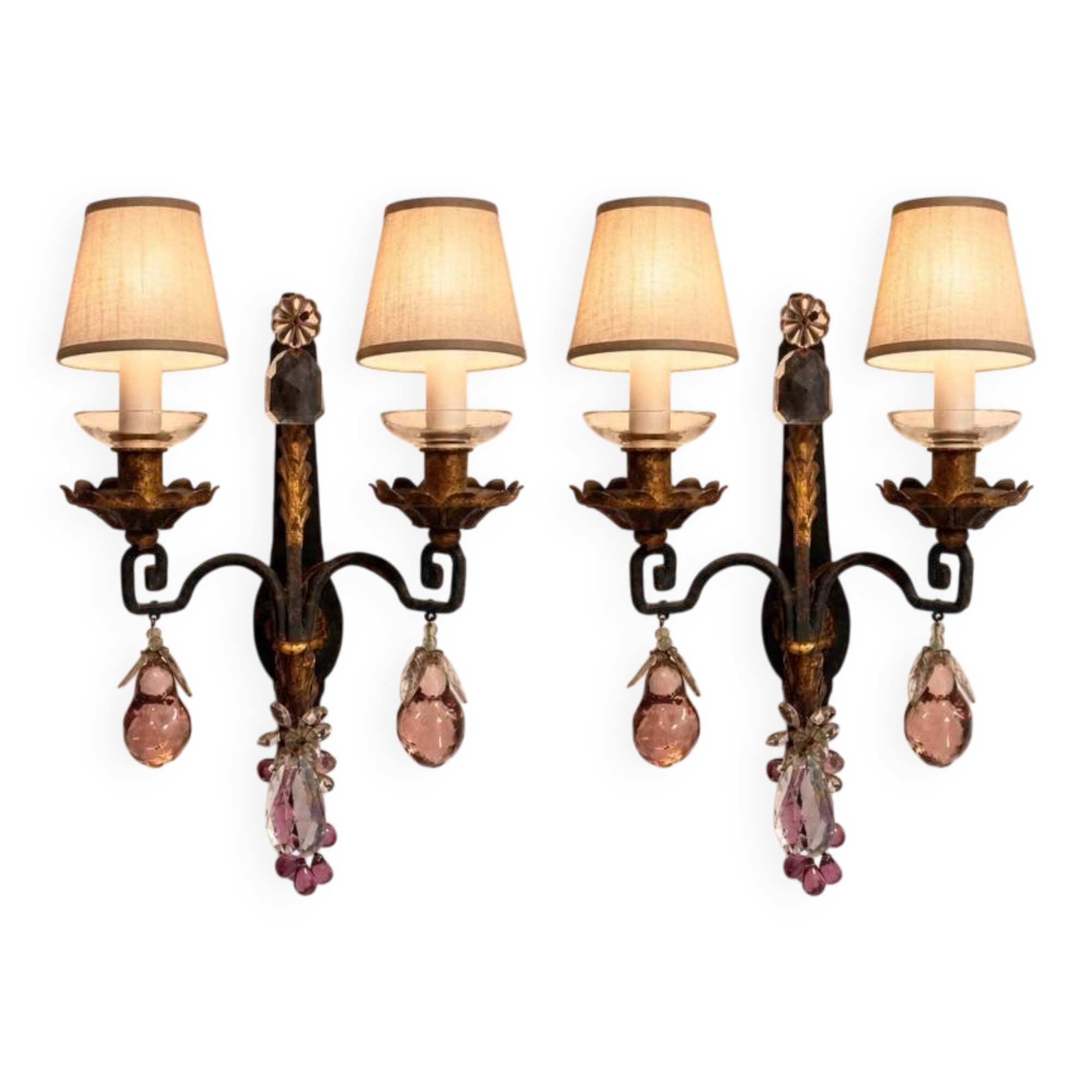 Maison Baguès, pair of wall sconces in wrought iron and gilded sheet metal, crystal pendants.