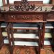 Art Nouveau buffet in carved oak with grapevine cluster decoration.