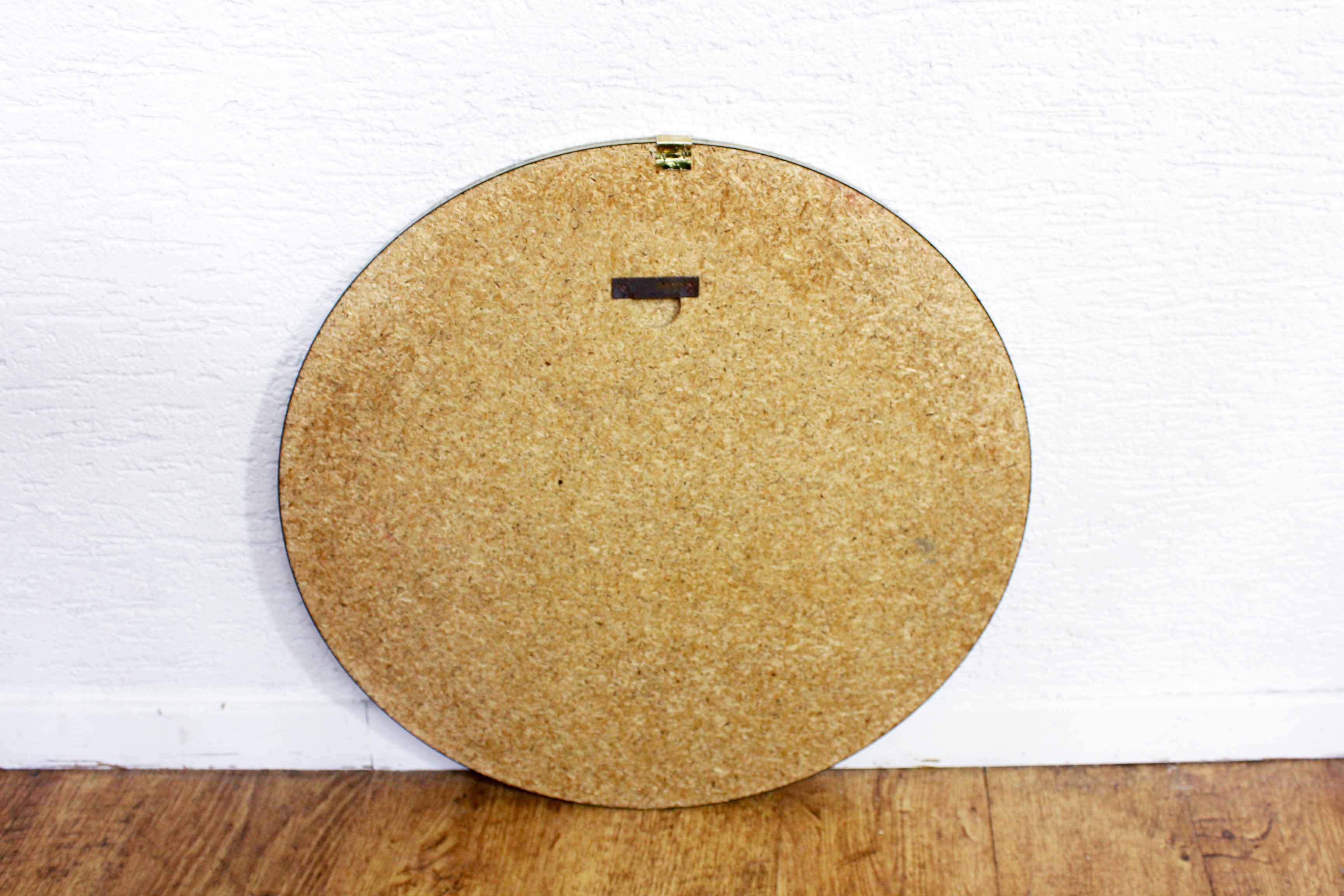 Black and gold 60s round mirror