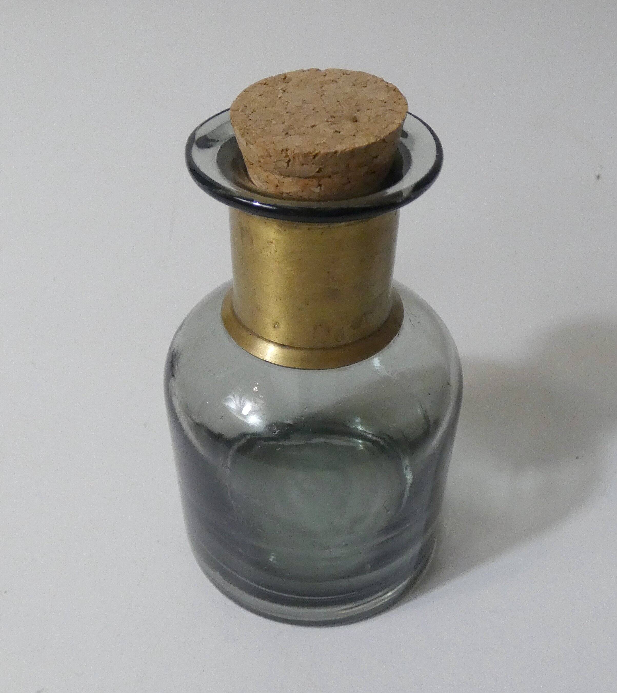 Smoked glass apothecary bottle with brass band