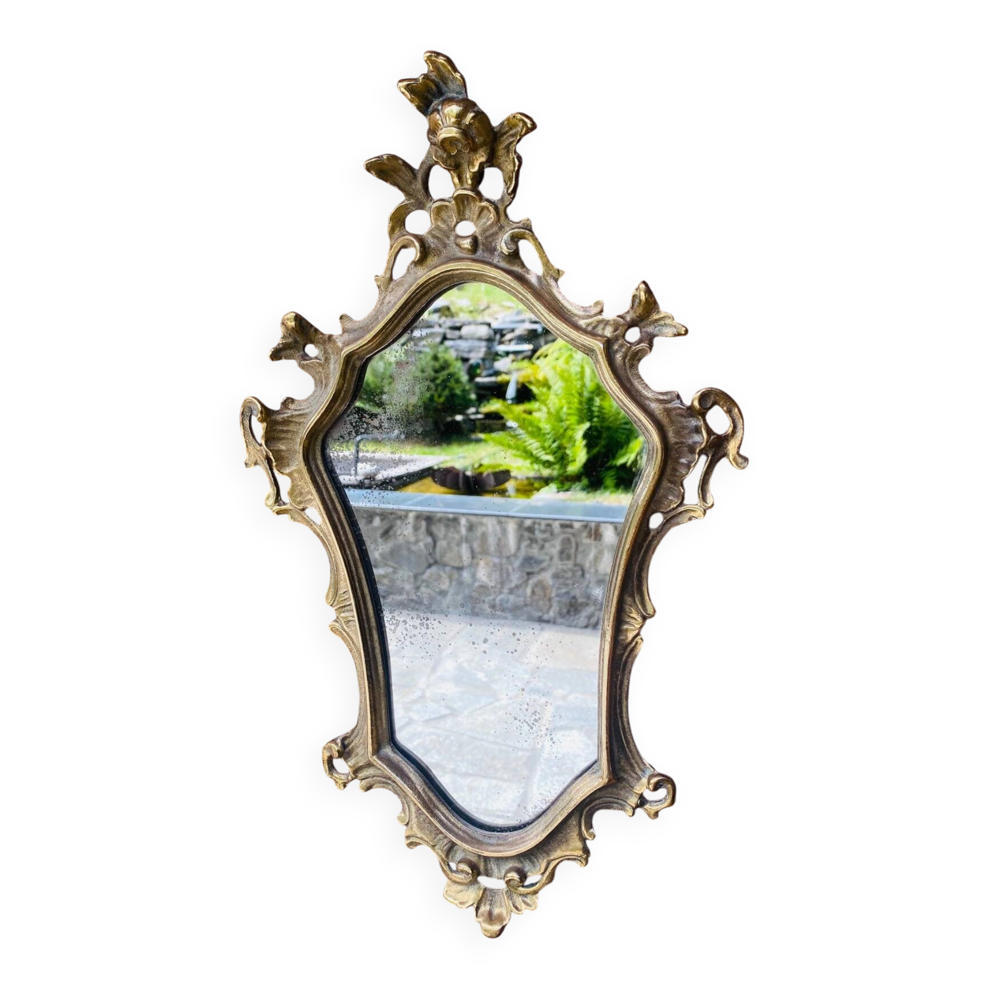 Magnificent antique baroque mirror in gilded bronze.