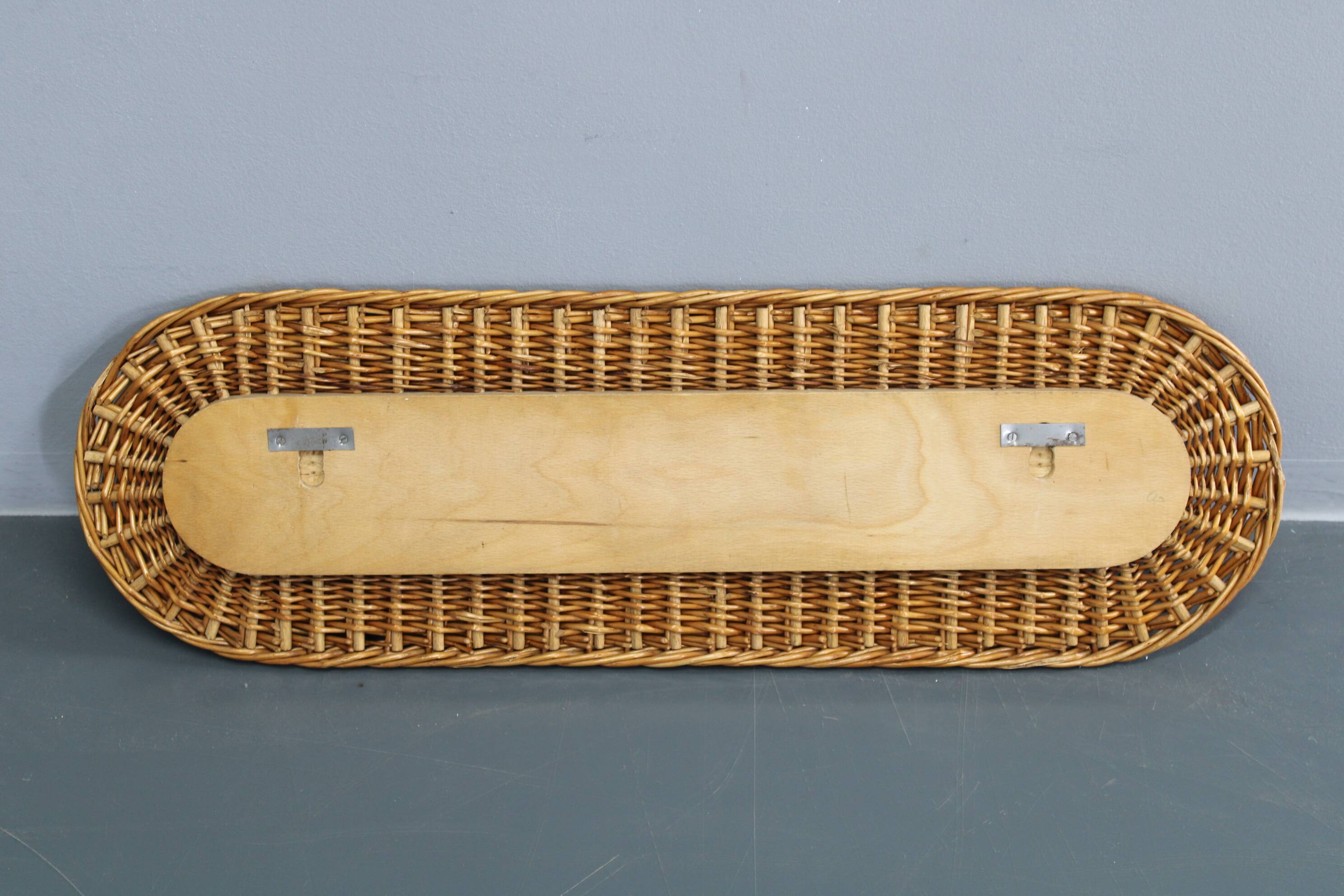 Mid-century wall coat rack with wicker frame, ULUV, 1970s