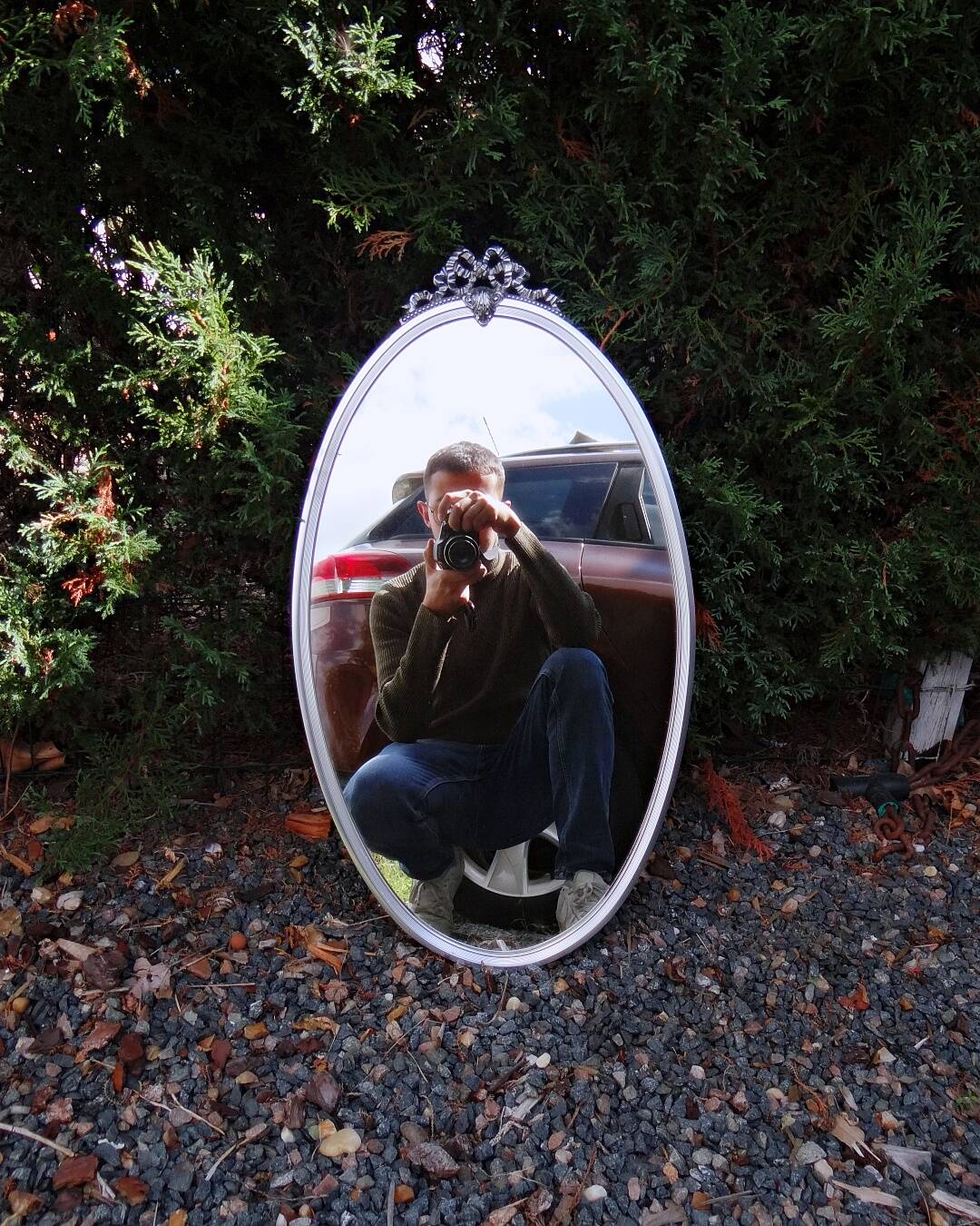 Oval mirror 66x37 Louis XVI style knot in vintage silver metal from the 70s
