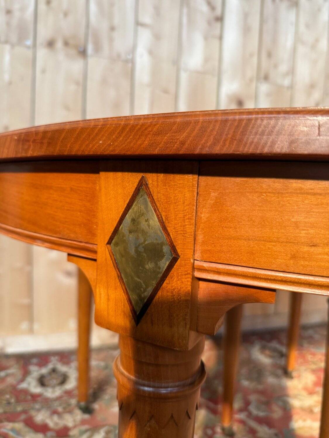 Louis XVI style dining table in cherry wood with extension.