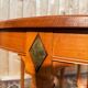 Louis XVI style dining table in cherry wood with extension.