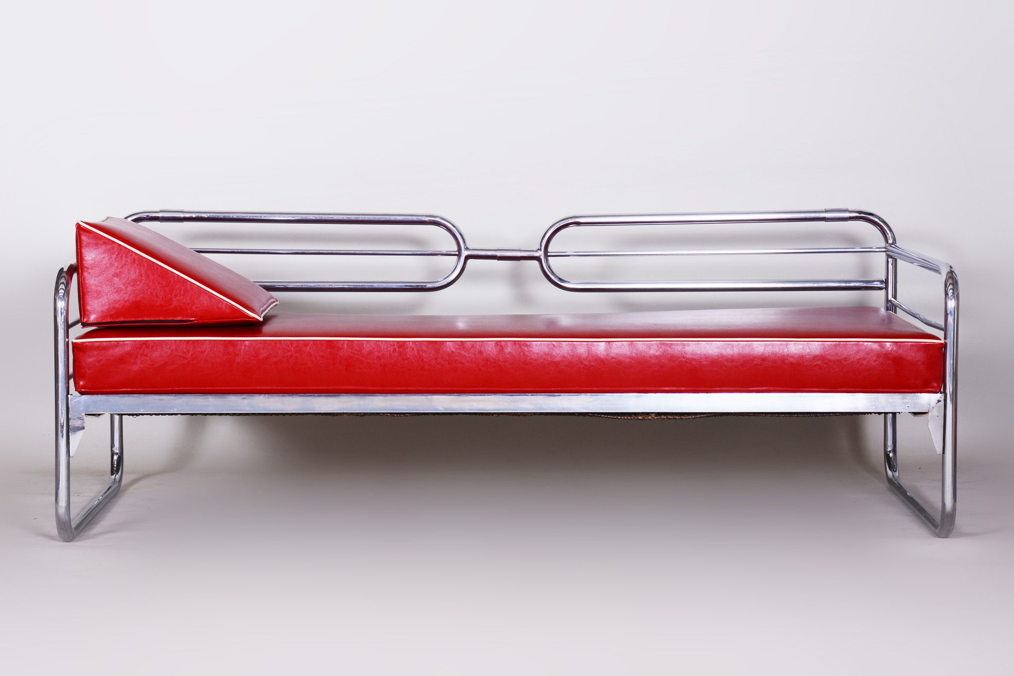 Red leather sofa by Hynekk Gottwald 1930
