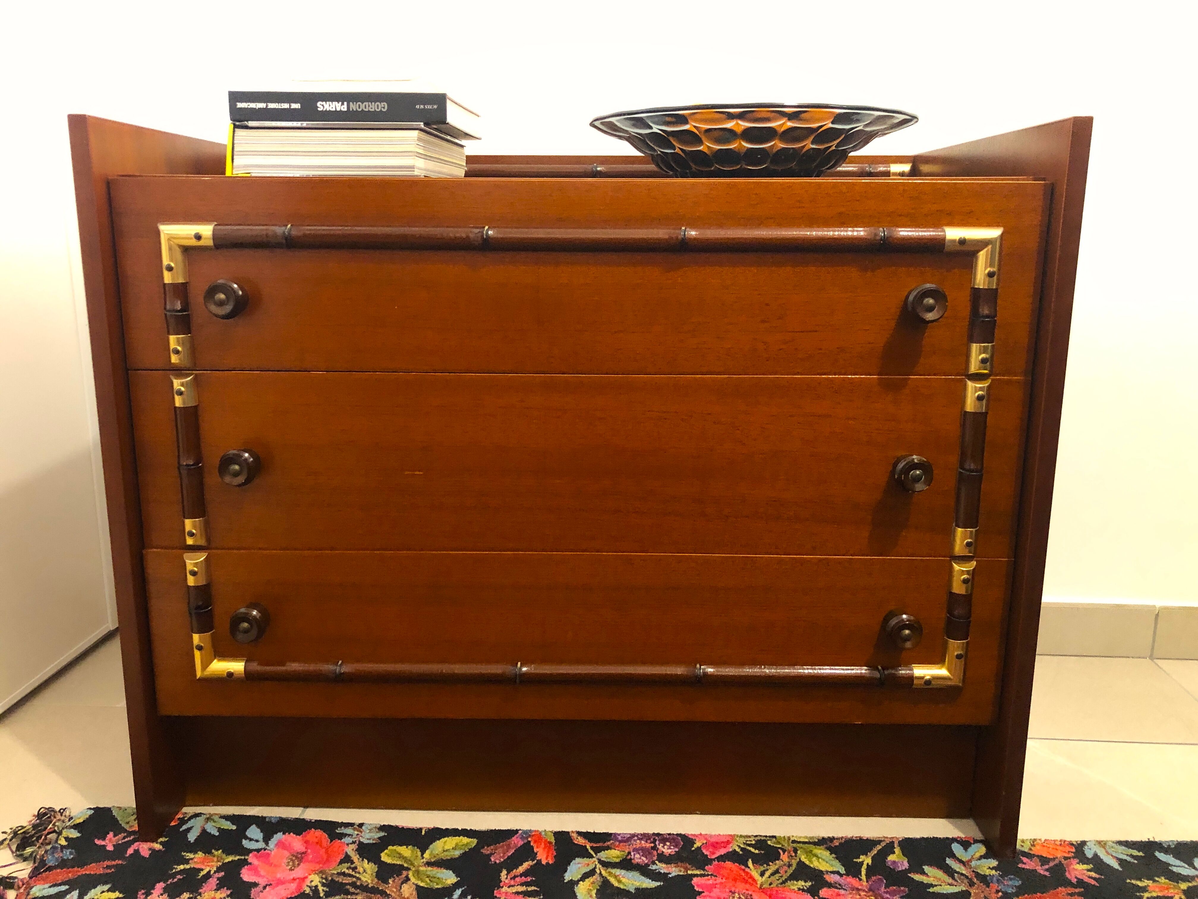 Vintage wooden and gilded chest of drawers colonial style