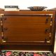 Vintage wooden and gilded chest of drawers colonial style