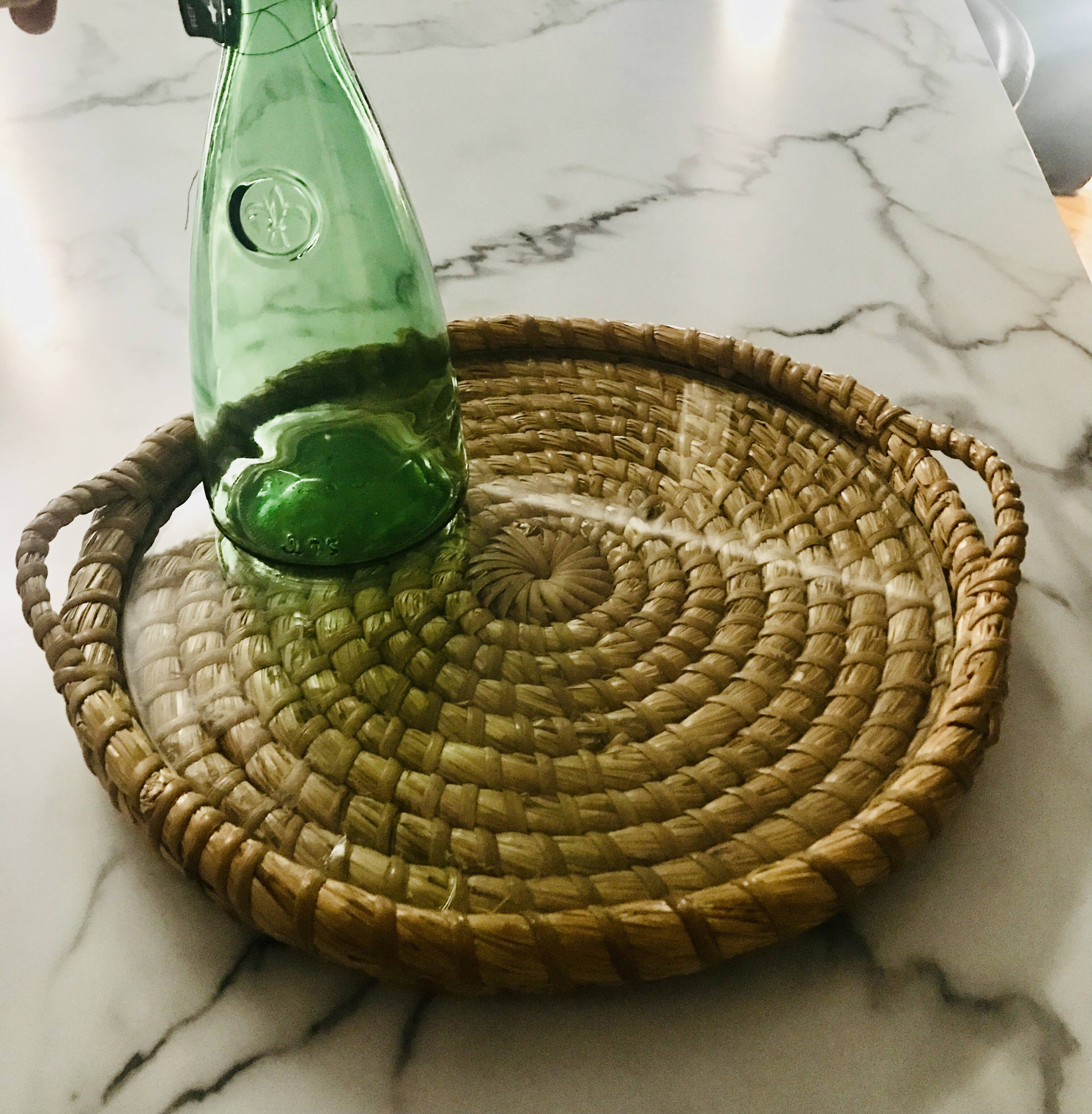 Turned wicker tray and vintage glass