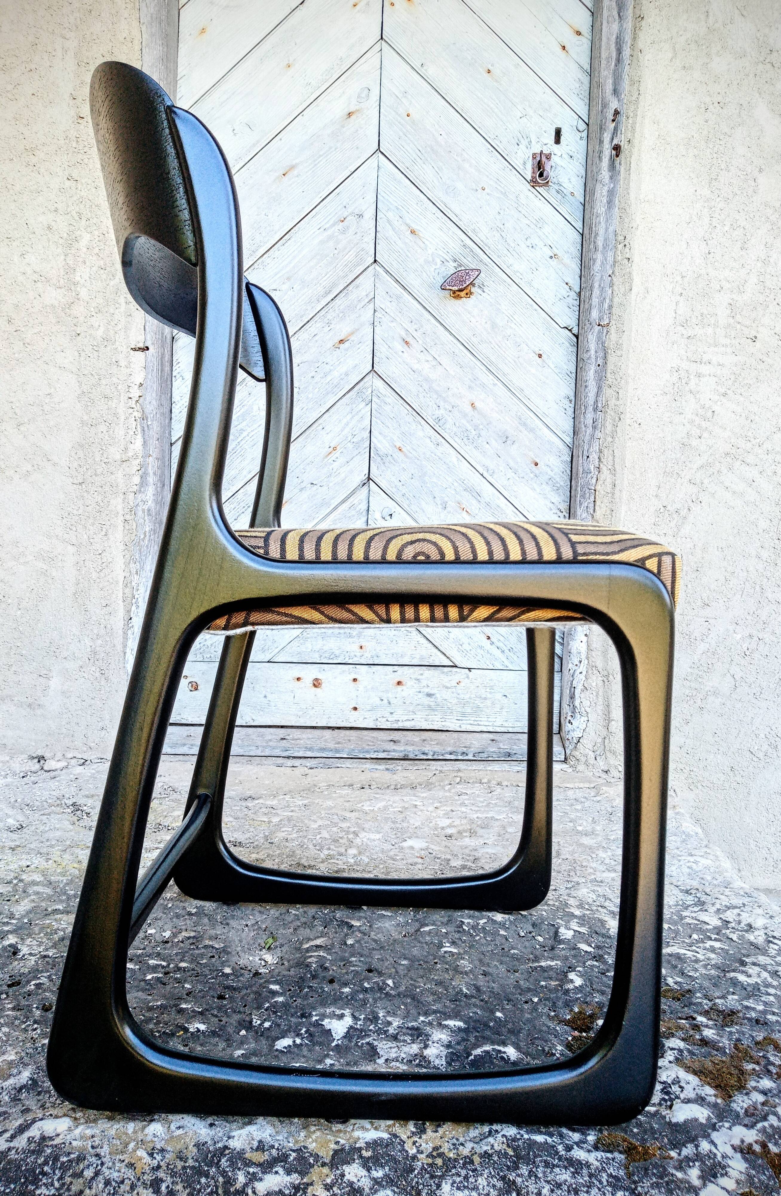 Set of four Baumann Bémole chairs "sled"