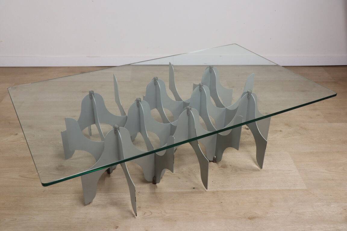 Minimalist sculptural coffee table in metal and glass