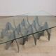 Minimalist sculptural coffee table in metal and glass