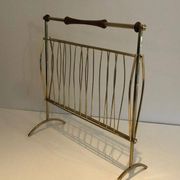 Brass and wood magazine rack, in the style of Cesare Lacca.