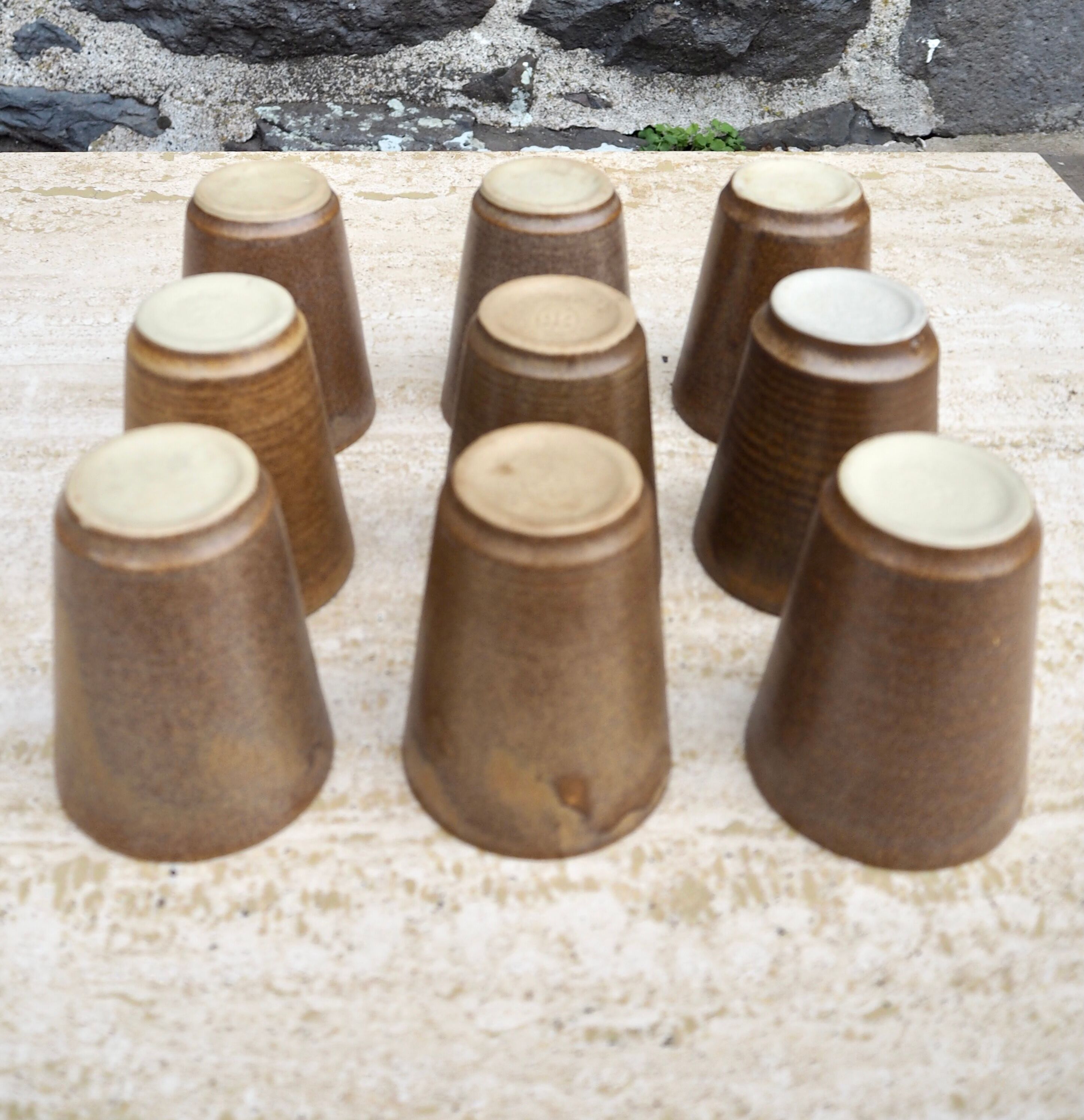 Set of 9 cups in Digoin sandstone