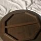 Ancient oriental pedestal table in carved wood