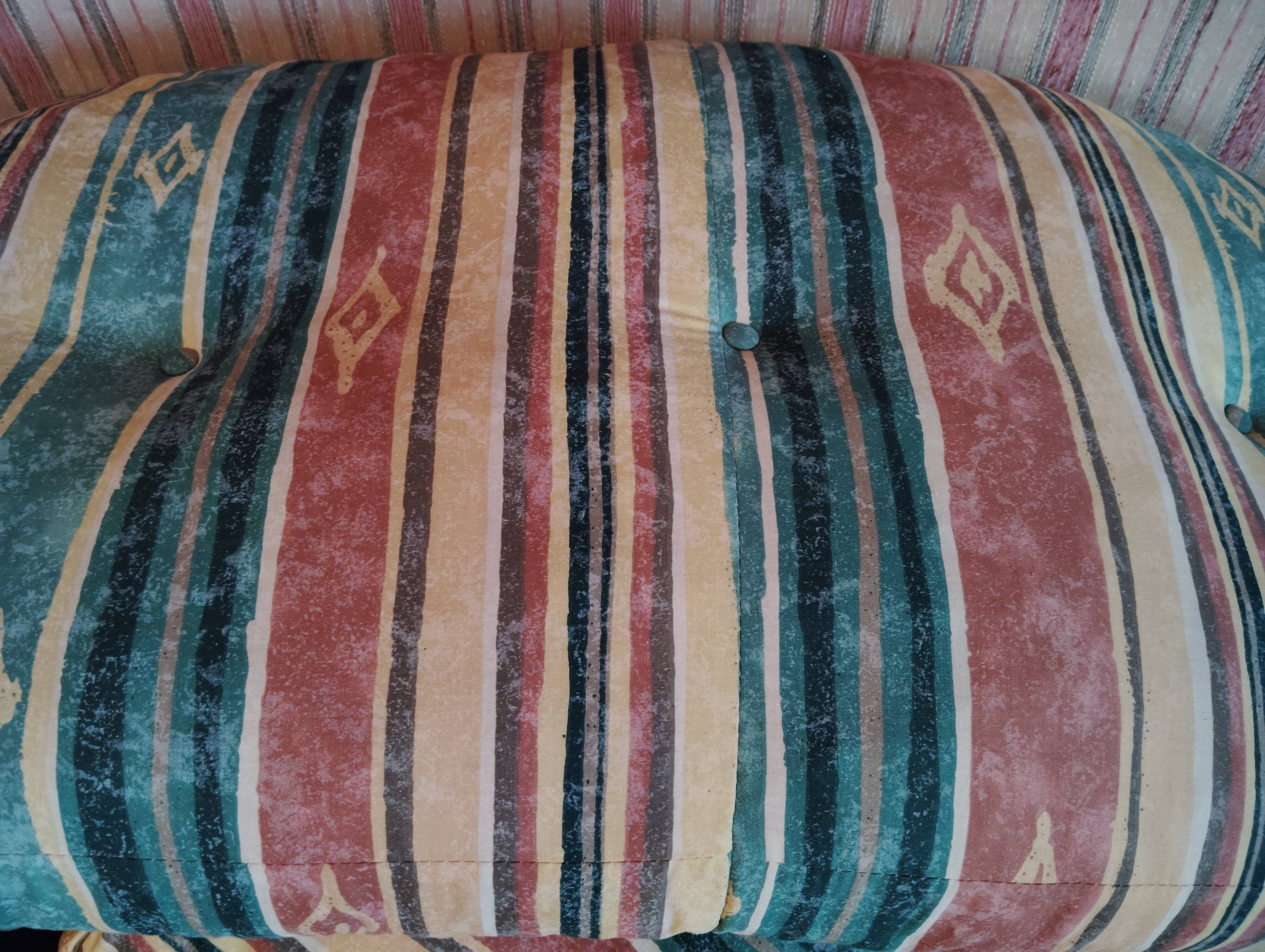 Rattan lounge with removable cushions