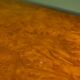 Vintage 1970s coffee table in chrome and burl wood.
