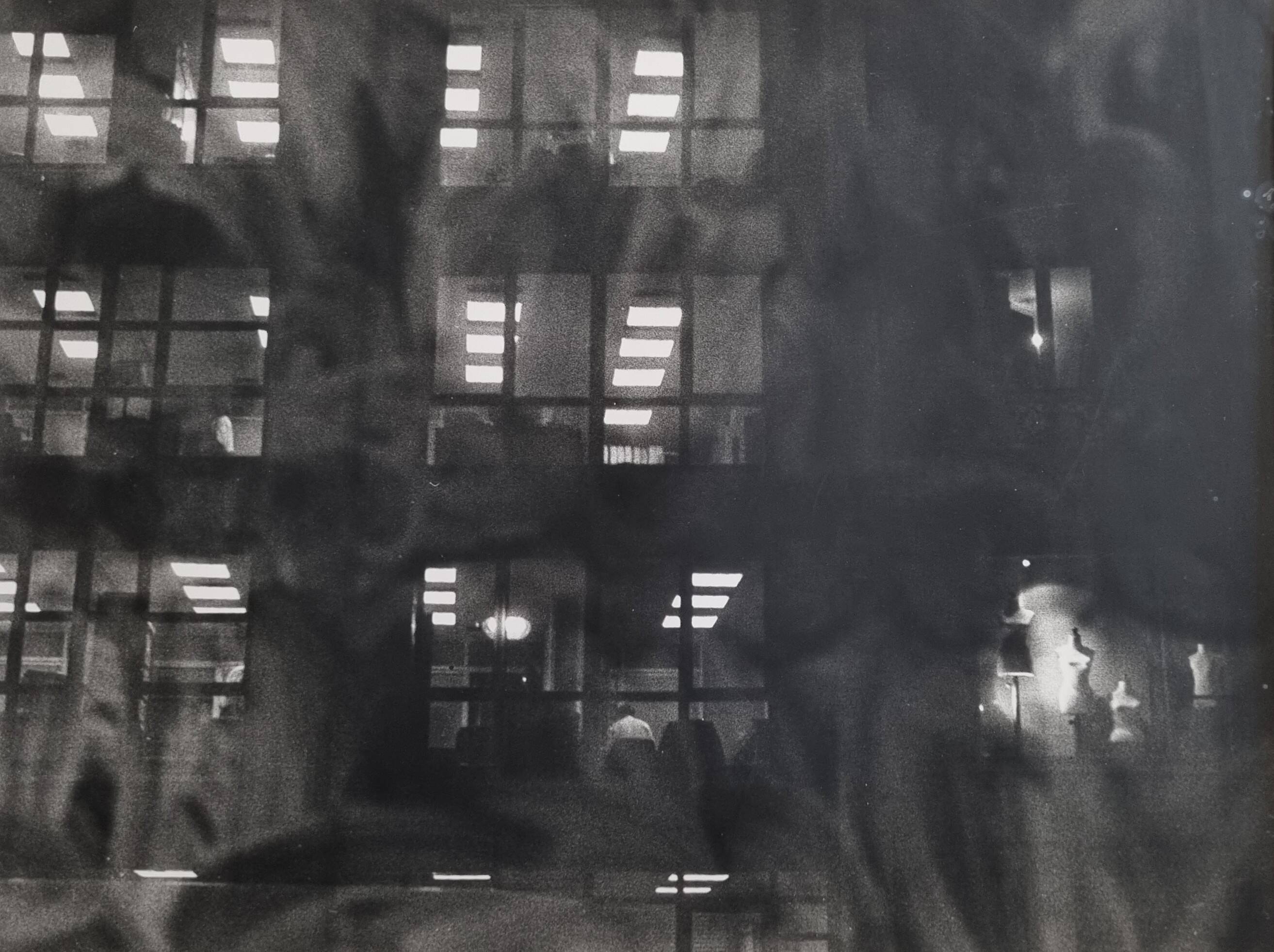 Framed black and white photograph of an urban scene by Rosine Nucimovici, 52x42 cm.
